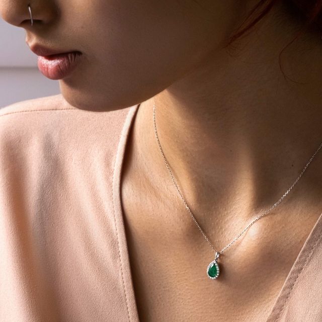 1.00 Ct Pear-Shaped Emerald Halo Pendant In White Gold