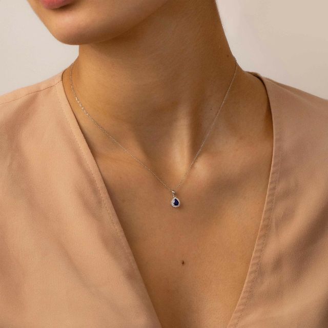 0.50 Carat Blue Sapphire And Diamond White Gold Halo Pendant Necklace