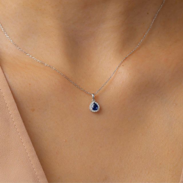 0.50 Carat Blue Sapphire And Diamond White Gold Halo Pendant Necklace
