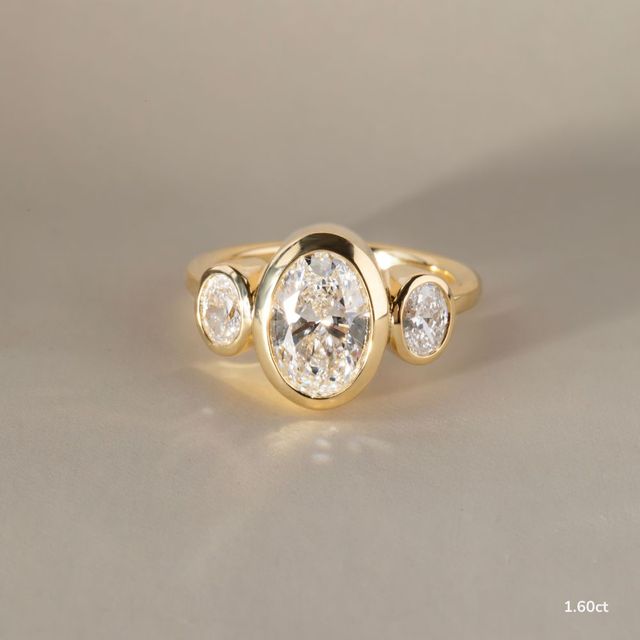 Varani Yellow Gold Rub-Over Three Stone Engagement Ring