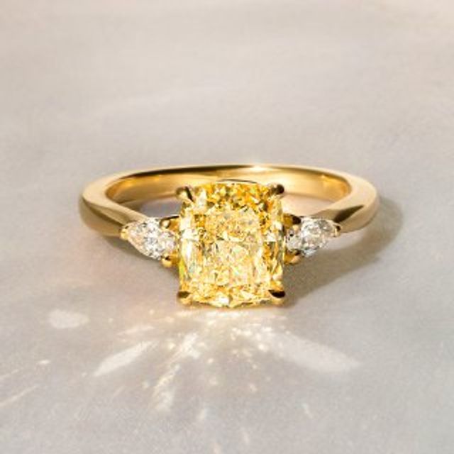 Elongated-Cushion Fancy Yellow Diamond Yellow Gold Trilogy Engagement Ring-3.01ct