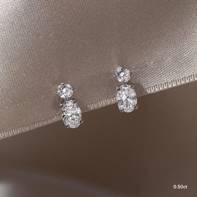 Drop Oval Diamond Earrings In White Gold