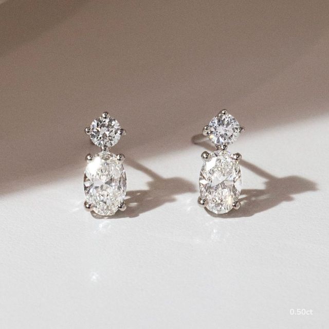 Drop Oval Diamond Earrings In White Gold