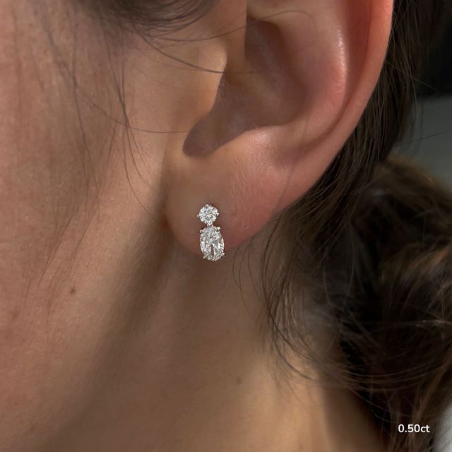 Drop Oval Diamond Earrings In White Gold
