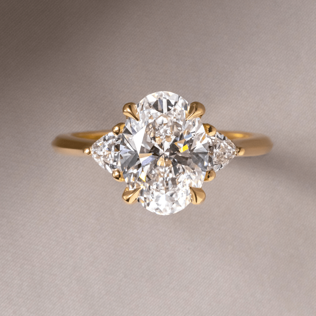 3 Carat Oval Diamond Trilogy Engagement Ring In 18K Yellow Gold - Manilla