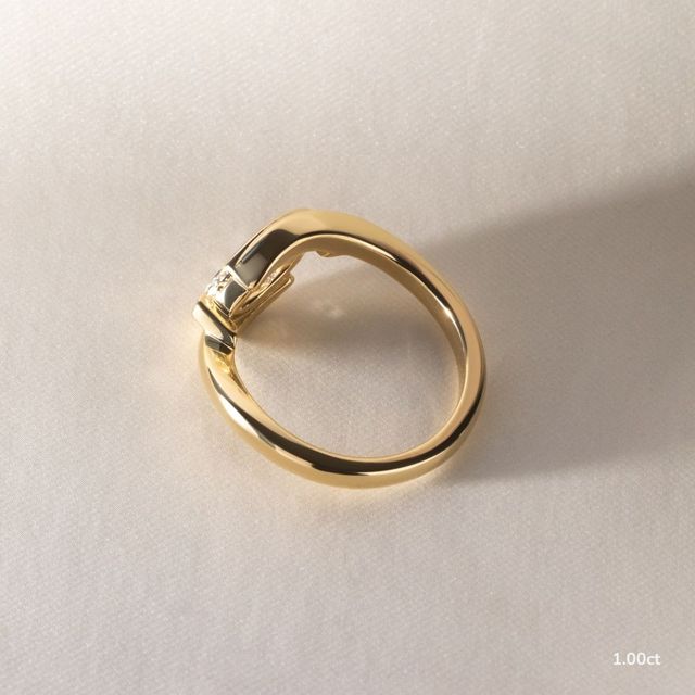 Naia Yellow Gold Solitaire Engagement Ring
