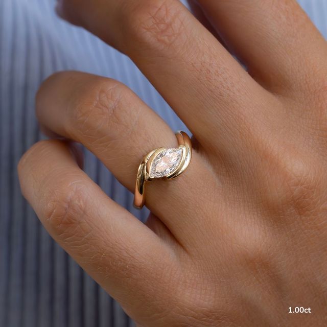 Naia Yellow Gold Solitaire Engagement Ring