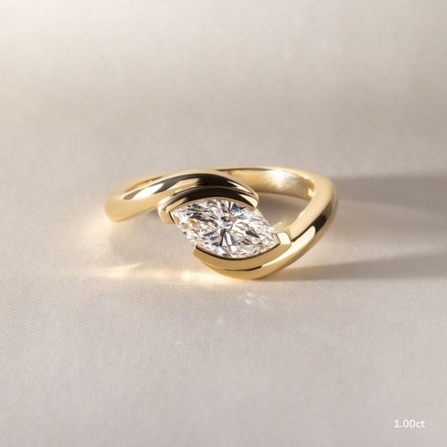 Naia Yellow Gold Solitaire Engagement Ring