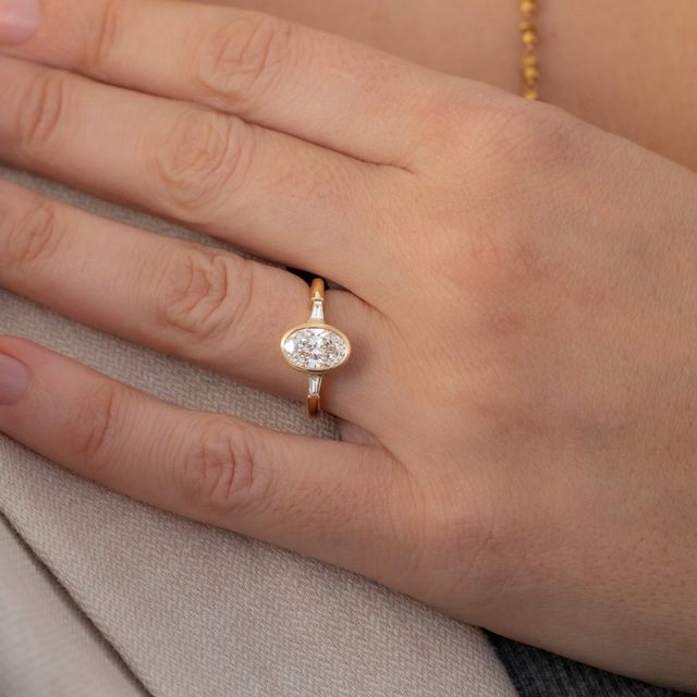 1.50 Carat Oval Diamond Bezel-Set Ring In Yellow Gold - Dawn