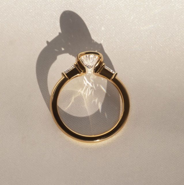 1.50 Carat Oval Diamond Bezel-Set Ring In Yellow Gold - Dawn