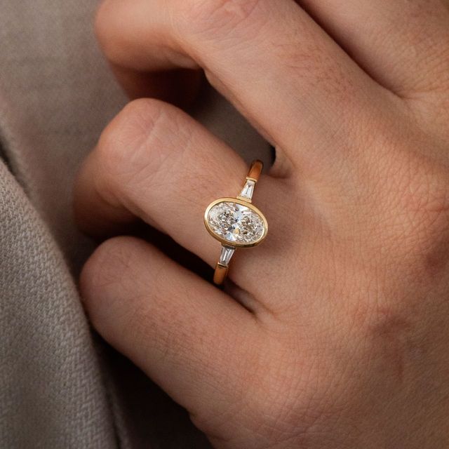 1.50 Carat Oval Diamond Bezel-Set Ring In Yellow Gold - Dawn