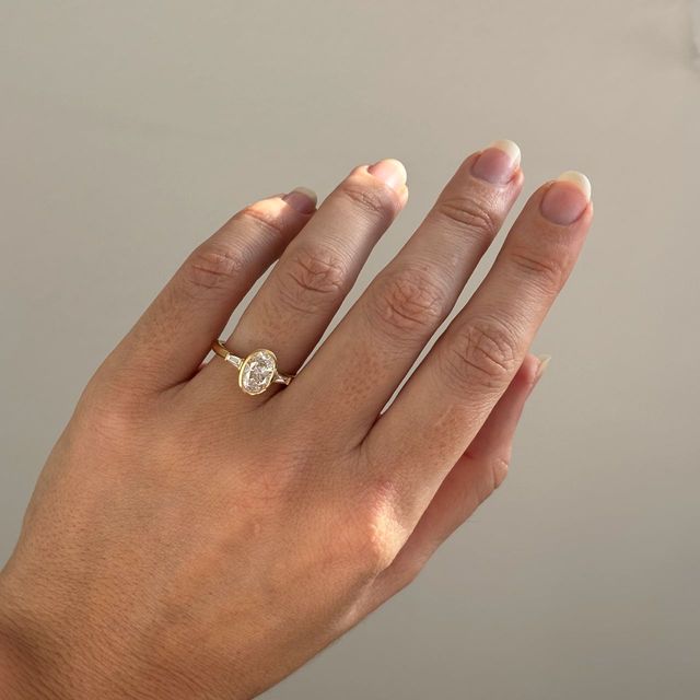 1.50 Carat Oval Diamond Bezel-Set Ring In Yellow Gold - Dawn