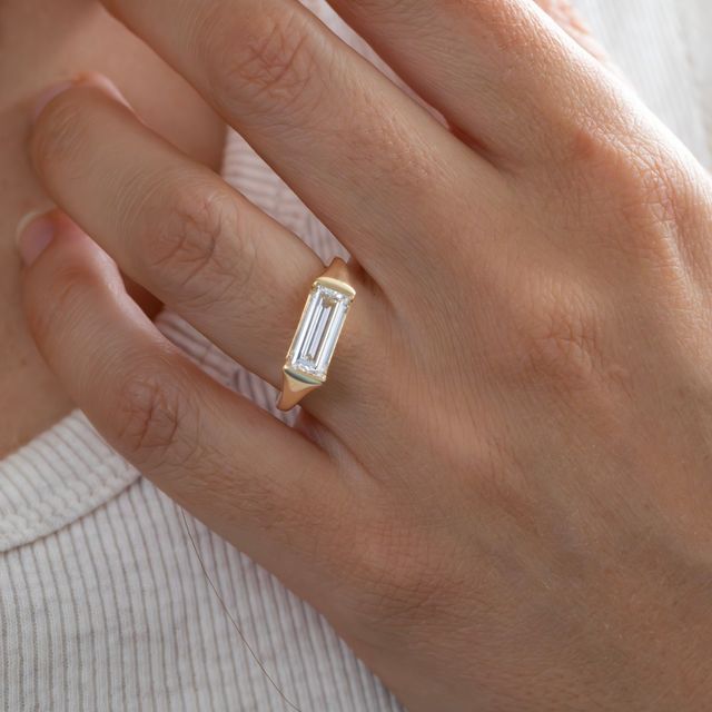 2 Carat Baguette Diamond Bezel Set Ring In Yellow Gold - East West
