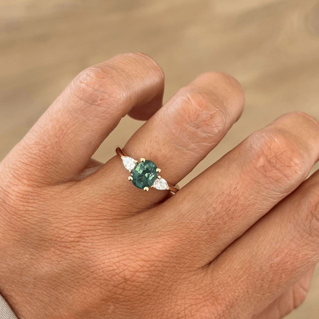 1.70 Carat Oval Natural Teal Sapphire Trilogy Ring In Yellow Gold -Vivian