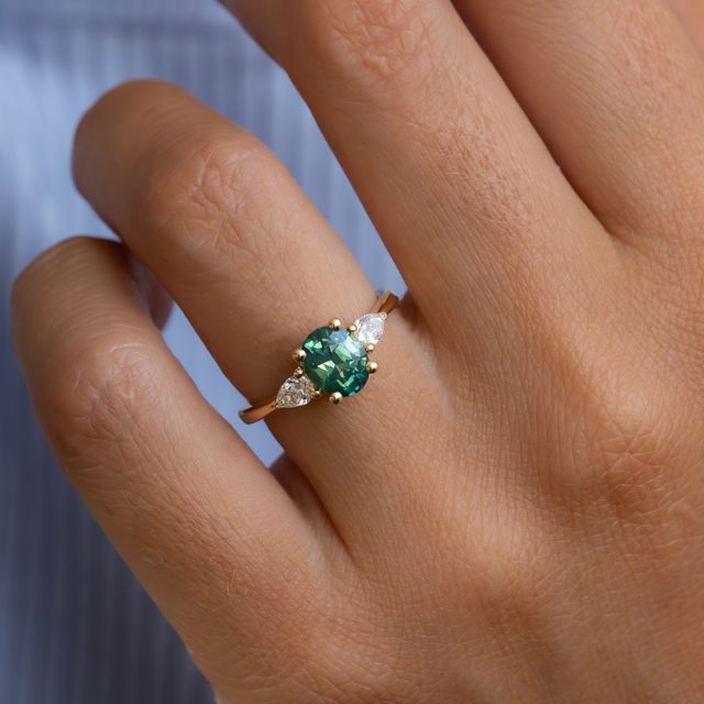 1.70 Carat Oval Natural Teal Sapphire Trilogy Ring In Yellow Gold -Vivian