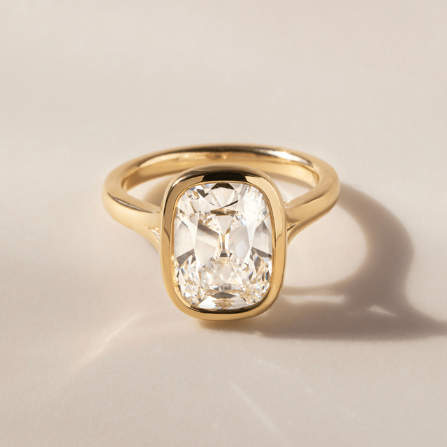 4.63 Carat Elongated Cushion Old Mine Cut Bezel Set Solitaire Ring In Yellow Gold - London