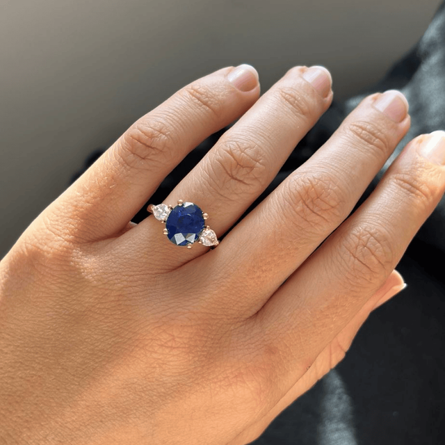5.09 Carat Oval Blue Sapphire Trilogy Engagement Ring In Yellow Gold - Nimi