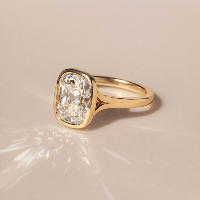 4.63 Carat Elongated Cushion Old Mine Cut Bezel Set Solitaire Ring In Yellow Gold - London