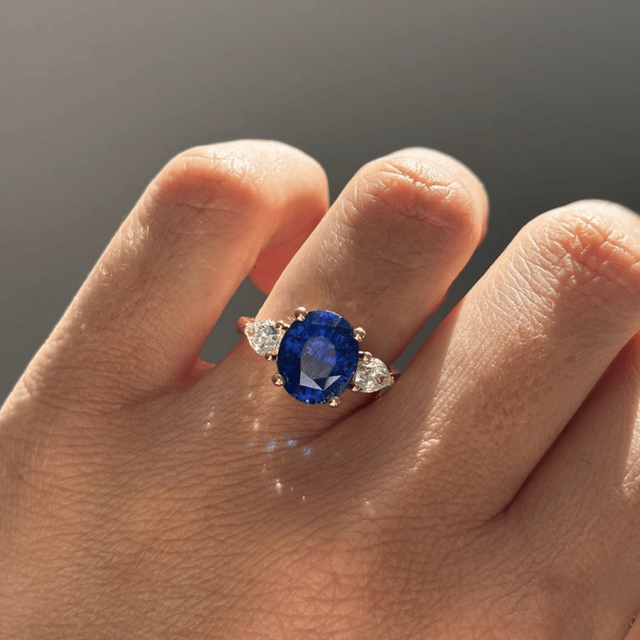 5.09 Carat Oval Blue Sapphire Trilogy Engagement Ring In Yellow Gold - Nimi
