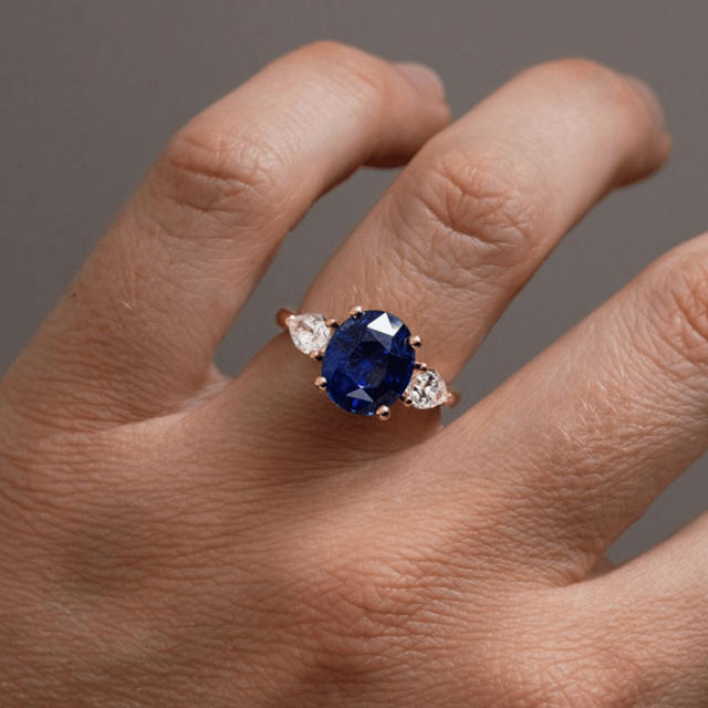 5.09 Carat Oval Blue Sapphire Trilogy Engagement Ring In Yellow Gold - Nimi