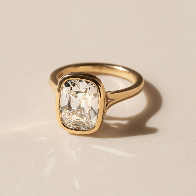 4.63 Carat Elongated Cushion Old Mine Cut Bezel Set Solitaire Ring In Yellow Gold - London