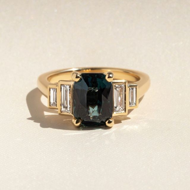 3.53 Carat Emerald-Cut Teal Sapphire Five Stone Engagement Ring In Yellow Gold - Lapilli