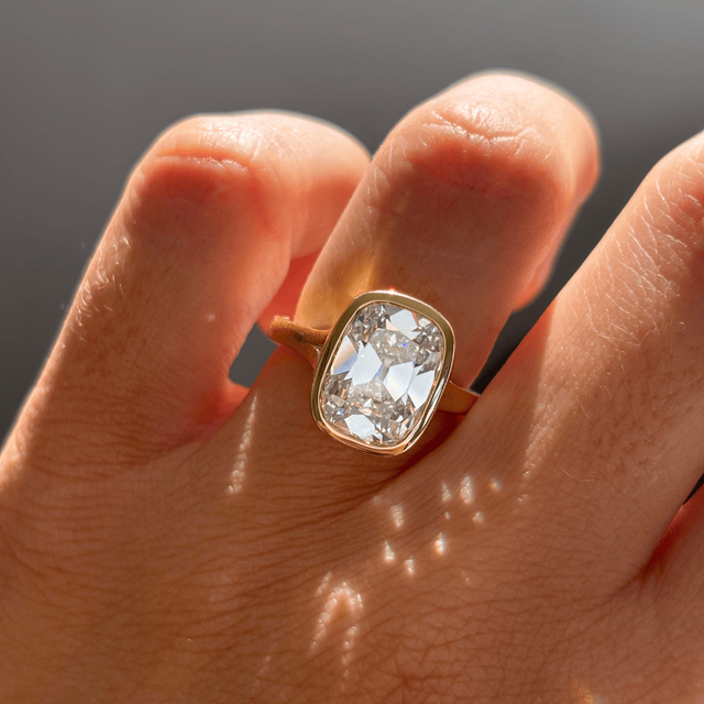4.63 Carat Elongated Cushion Old Mine Cut Bezel Set Solitaire Ring In Yellow Gold - London