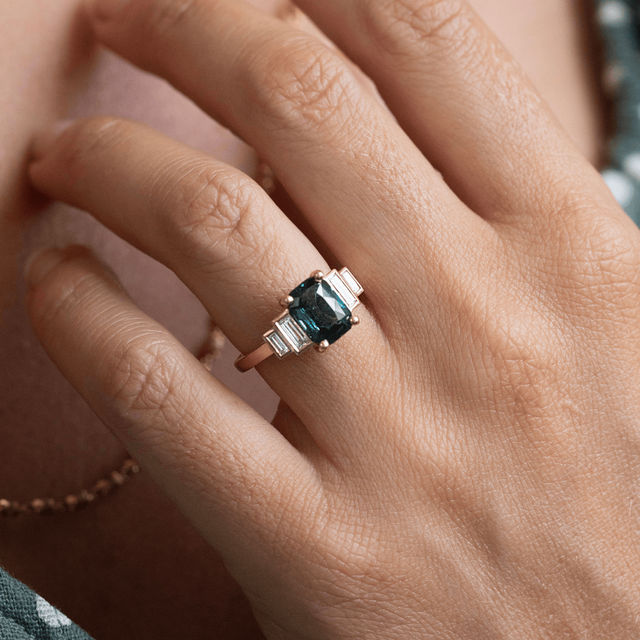 3.53 Carat Emerald-Cut Teal Sapphire Five Stone Engagement Ring In Yellow Gold - Lapilli
