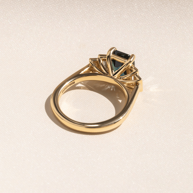 3.53 Carat Emerald-Cut Teal Sapphire Five Stone Engagement Ring In Yellow Gold - Lapilli