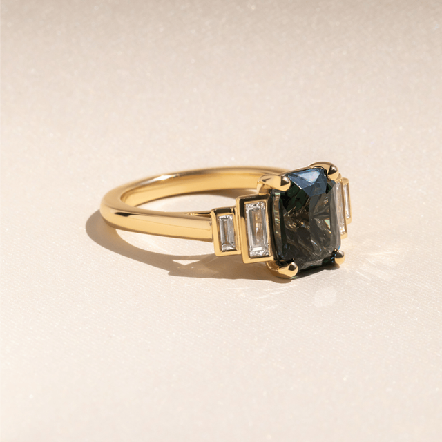 3.53 Carat Emerald-Cut Teal Sapphire Five Stone Engagement Ring In Yellow Gold - Lapilli