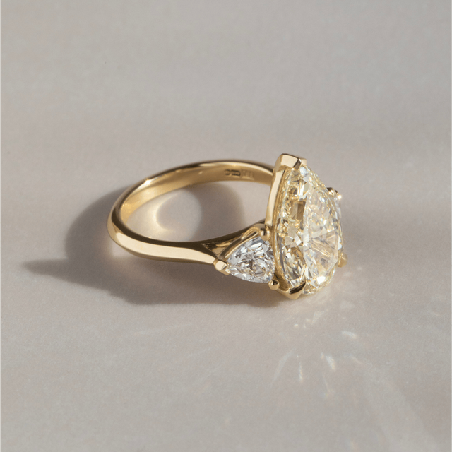 5.17 Carat Lab Grown Pear Yellow Diamond Trilogy Ring In Yellow Gold - Manilla