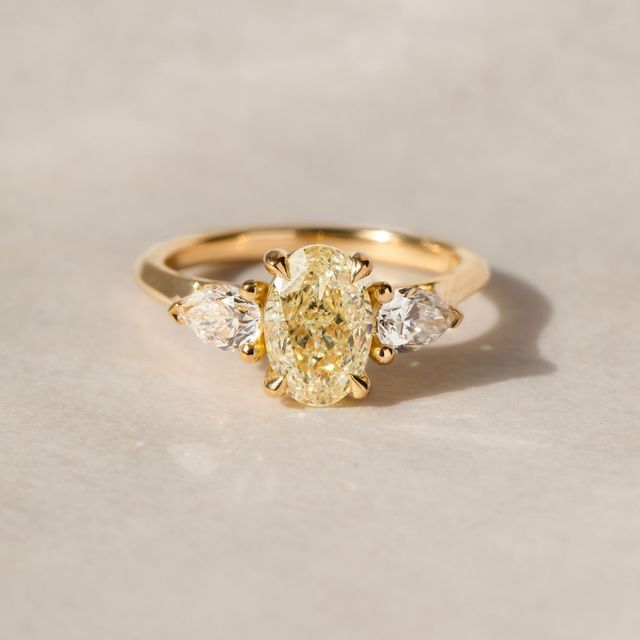 1.76 Carat Oval Yellow Diamond Trilogy Engagement Ring In Yellow Gold - Amaya