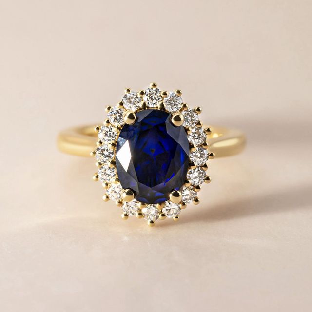 1.50 Carat Lab Grown Oval Blue Sapphire Cluster Engagement Ring In Yellow Gold - Windermere