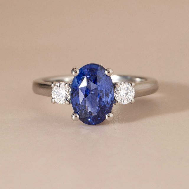 3.11 Carat Oval Blue Sapphire Three Stone Engagement Ring in Platinum - Avalon