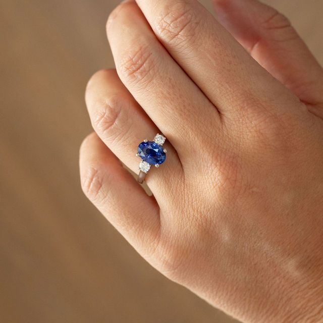 3.11 Carat Oval Blue Sapphire Three Stone Engagement Ring in Platinum - Avalon