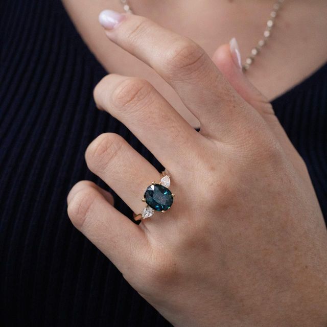 4.57 Carat Oval Green Sapphire Trilogy Engagement Ring in Yellow Gold - Amaya