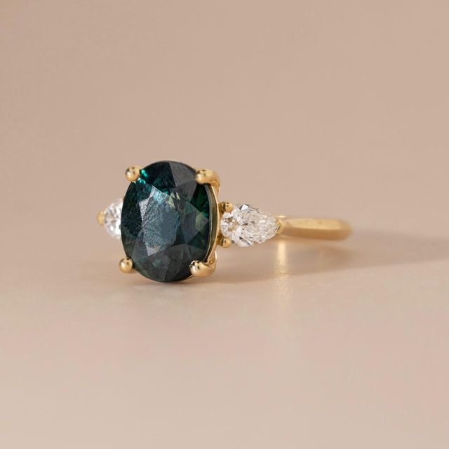 4.57 Carat Oval Green Sapphire Trilogy Engagement Ring in Yellow Gold - Amaya