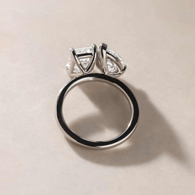 4.50 Carat Emerald And Pear Diamond Toi et Moi Engagement Ring in Platinum