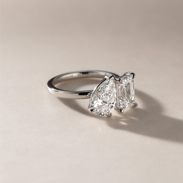 4.50 Carat Emerald And Pear Diamond Toi et Moi Engagement Ring in Platinum