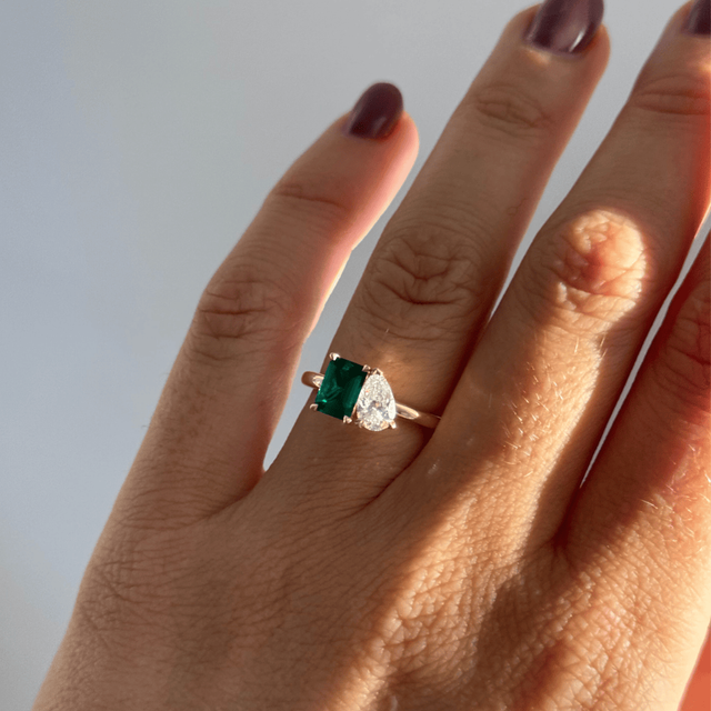 2.00 Carat Green Emerald And Pear Diamond Toi et Moi Engagement Ring in Yellow Gold