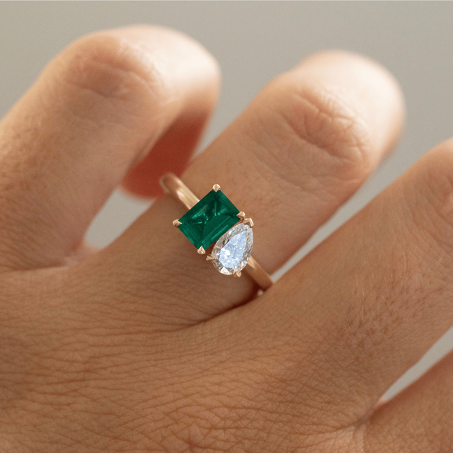 2.00 Carat Green Emerald And Pear Diamond Toi et Moi Engagement Ring in Yellow Gold