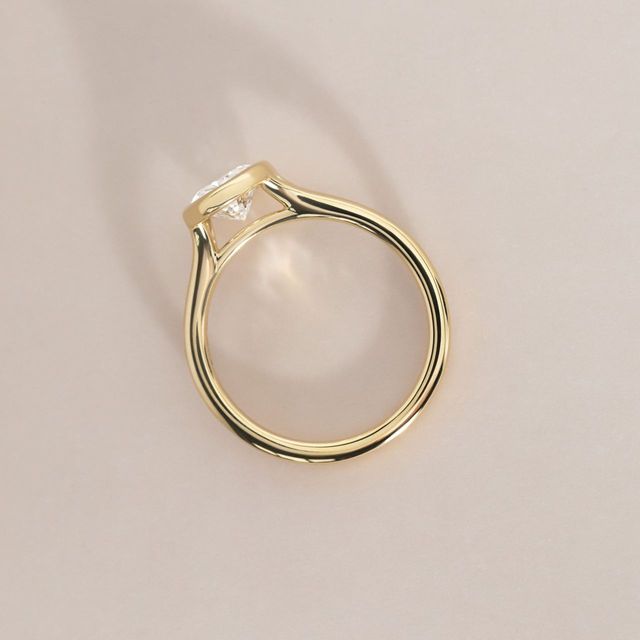 1.58 Carat Lab Grown Oval Bezel Set Solitaire Engagement Ring In Yellow Gold - London