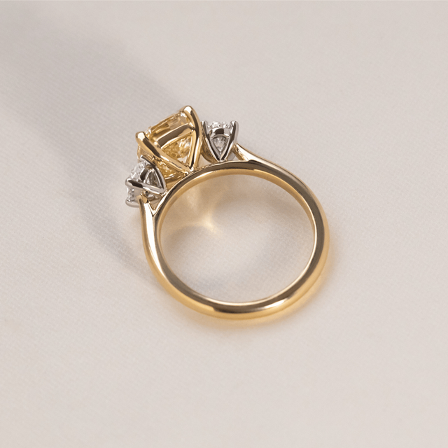 2.60 Carat Elongated Cushion Yellow Diamond Trilogy Bespoke Engagement Ring in Two Tone