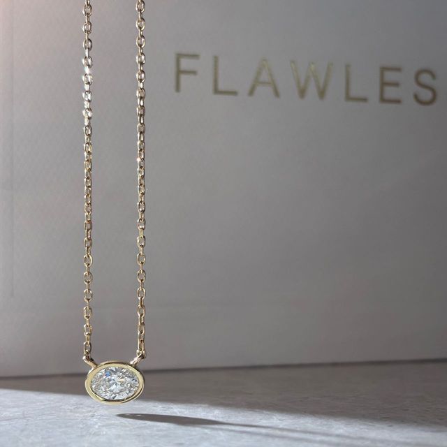 2.00 Carat East-West Bezel Set Oval Diamond Pendant in Yellow Gold