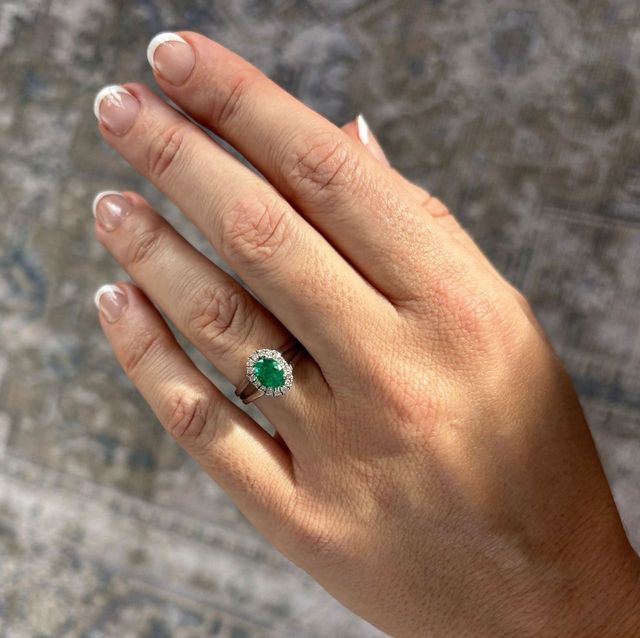 0.72 Carat Oval Green Emerald Halo Bespoke Engagement Ring in White Gold