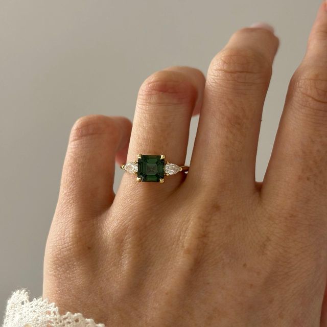 2.56 Carat Natural Square Emerald Teal Sapphire Trilogy Engagement Ring In Yellow Gold - Amaya