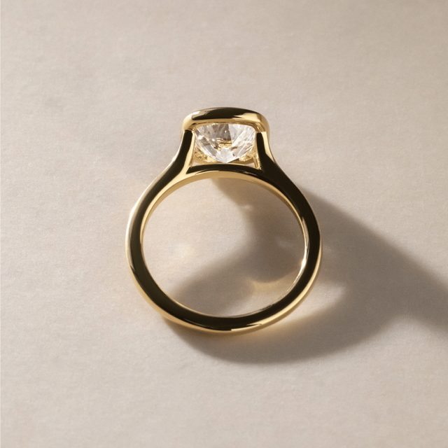 2.40 Carat Elongated Cushion Old Mine Cut Bezel Set Solitaire Ring in Yellow Gold - London
