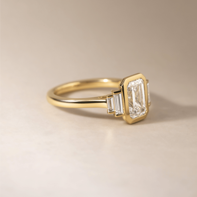 2.30 Carat Lab Grown Emerald Cut Diamond Bezel Set Engagement Ring in Yellow Gold - Lapilli Customised