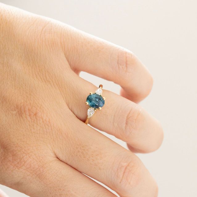 2.12 Carat Natural Oval Teal Sapphire Trilogy Engagement Ring in Yellow Gold - Vivian