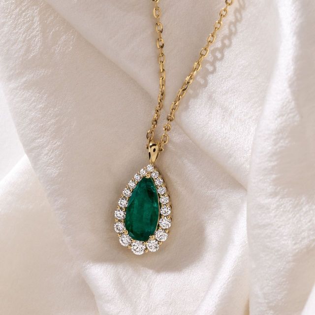 3.62 Carat Natural Pear Emerald Graduated Cluster Halo Pendant in Yellow Gold